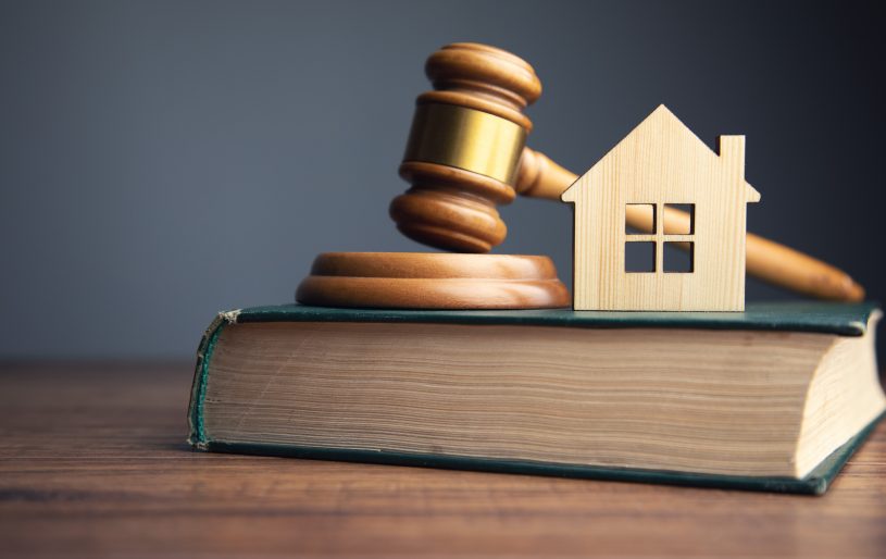 Lease agreement being reviewed by a landlord-tenant attorney